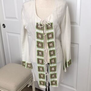 Beautiful Inca swim cover with beading.